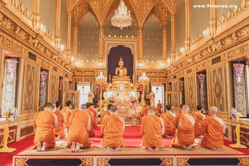 Thai monk meditating in a peaceful temple