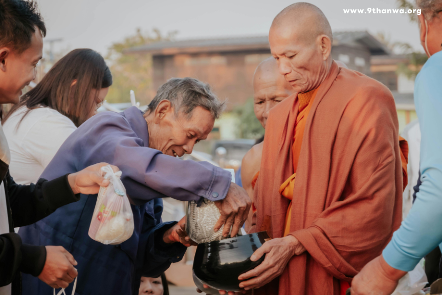 Thai monks receiving alms in the morning